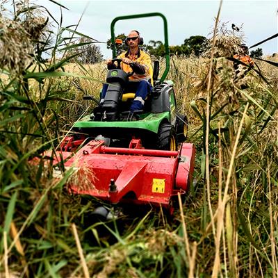 Old mower makes light work of rail trail